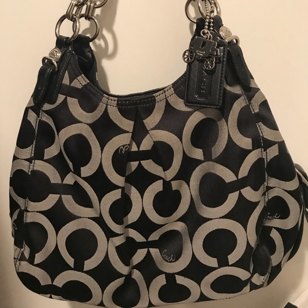 Black and gray Coach shoulder bag